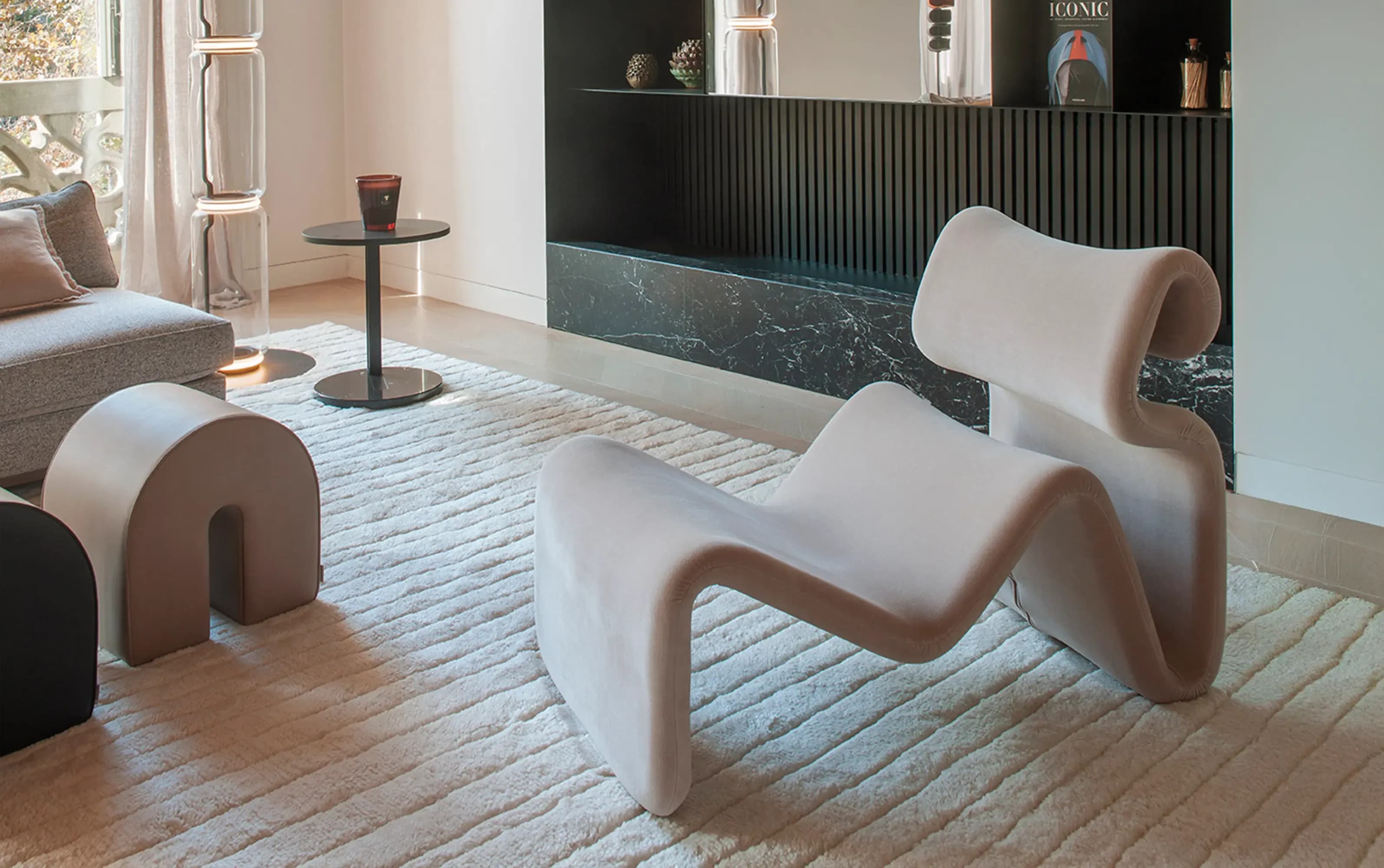 Modern sculptural lounge chair with organic curves · LUV Lifestyle FF&E
