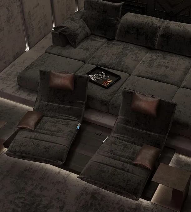 Warm home theater with wood wall panels and upholstered modular sofas