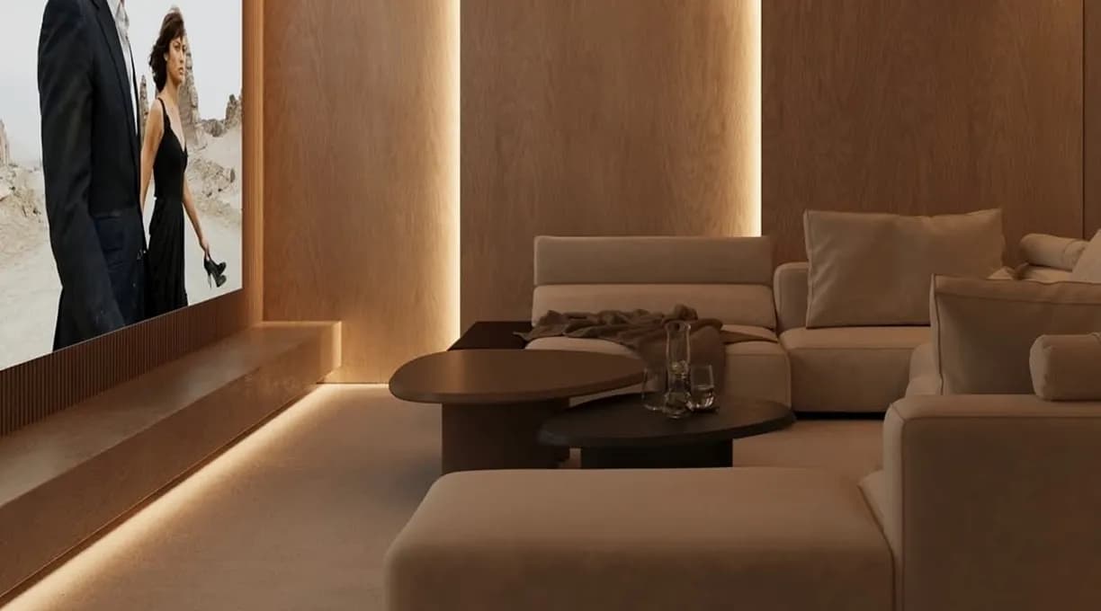 Dark home cinema with modular seating and integrated side tables