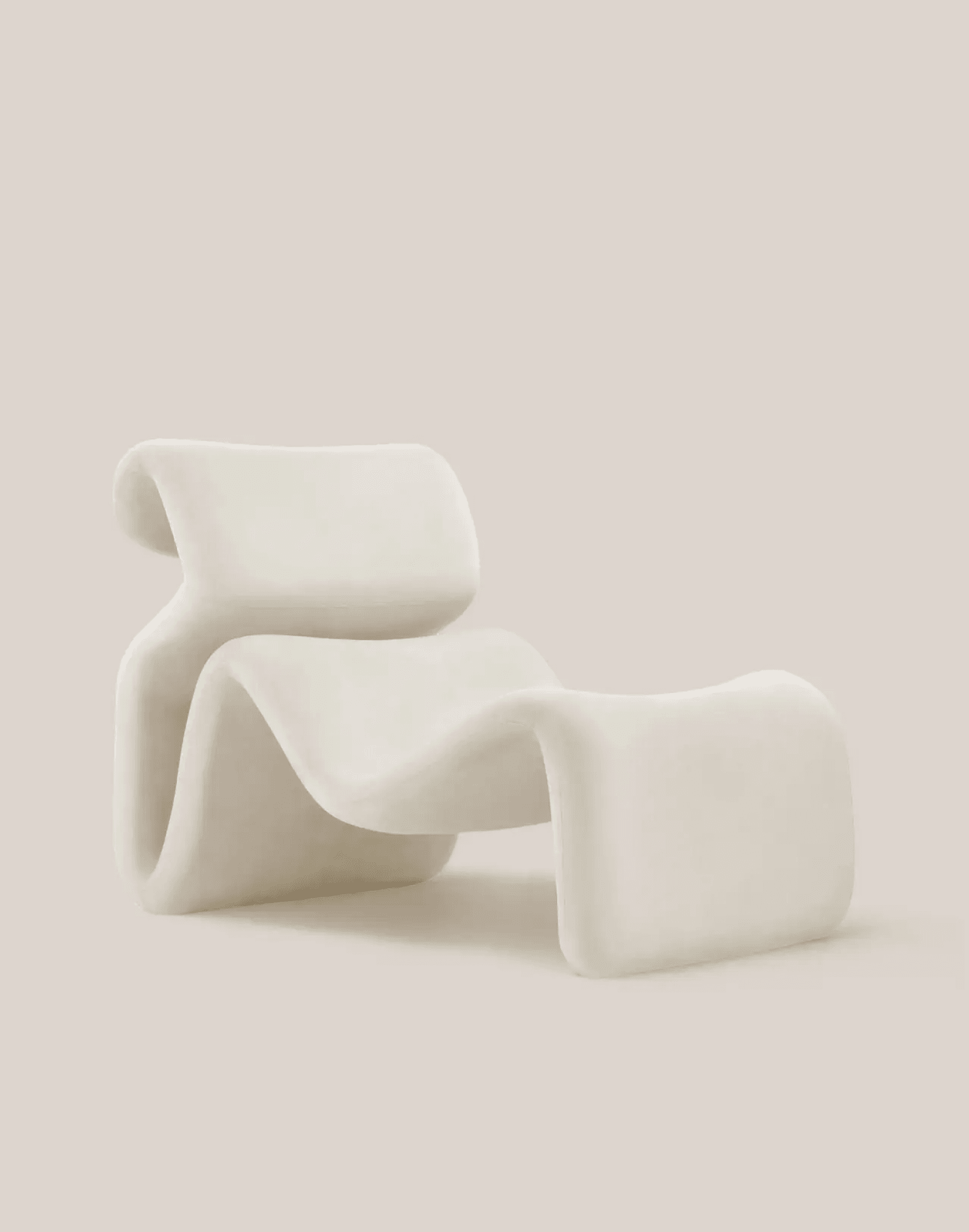 Sculptural lounge chair in a contemporary living room with natural light · LUV Lifestyle FF&E