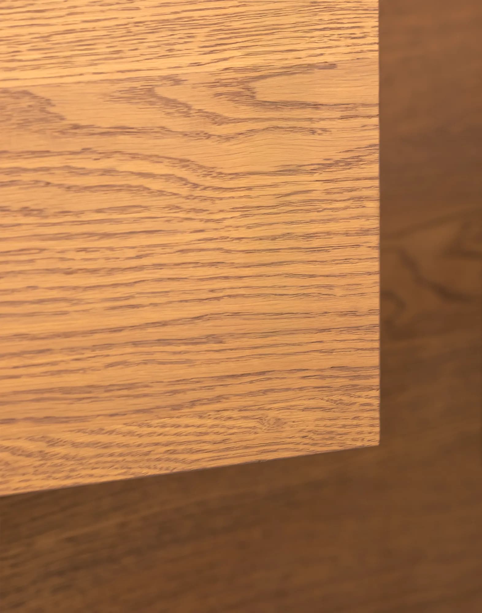 Natural oak wood texture with warm grain pattern, ideal for luxury furniture, flooring, and contemporary interior finishes.