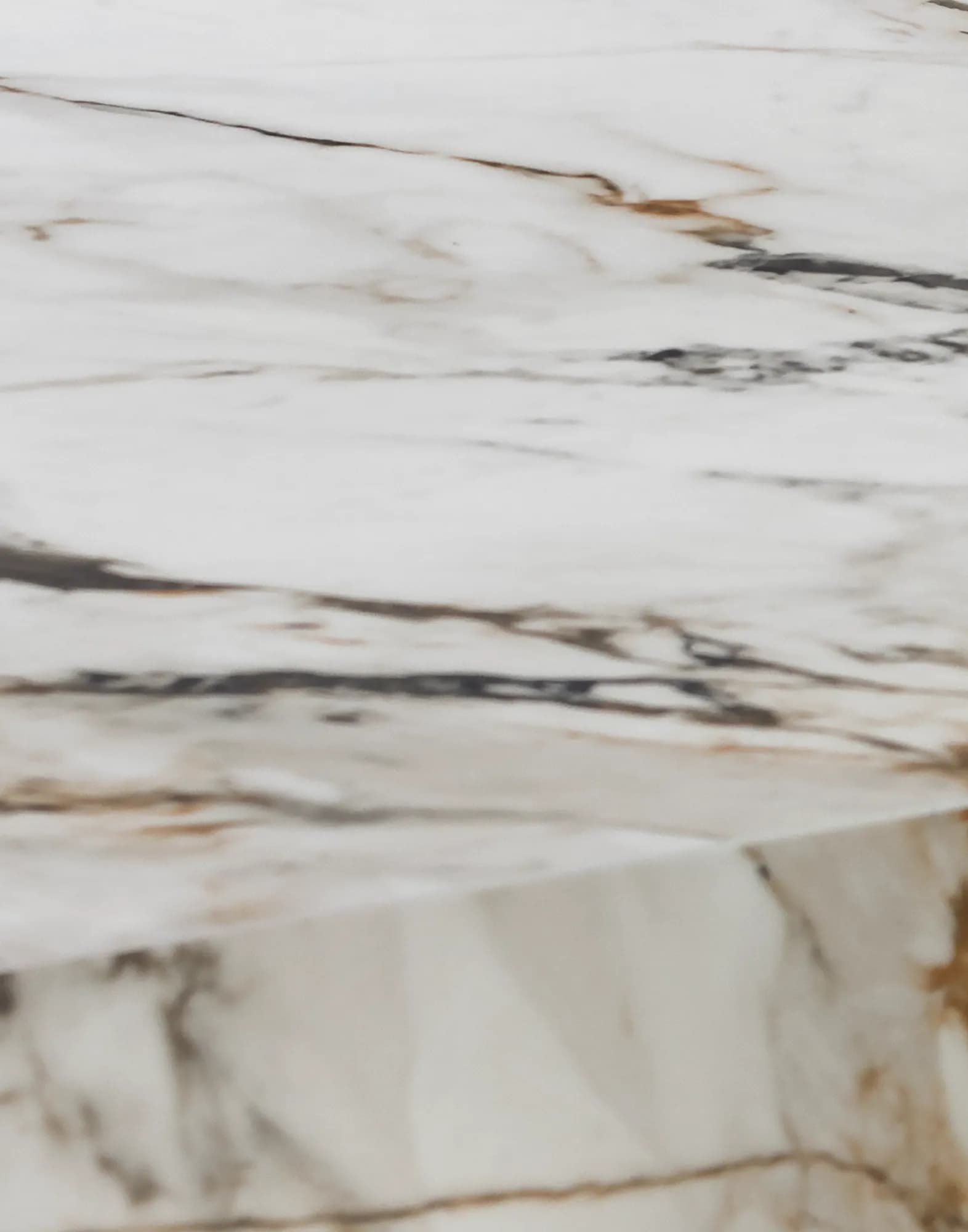Close-up of natural marble surface with elegant veining · LUV Lifestyle Quality Upgrade
