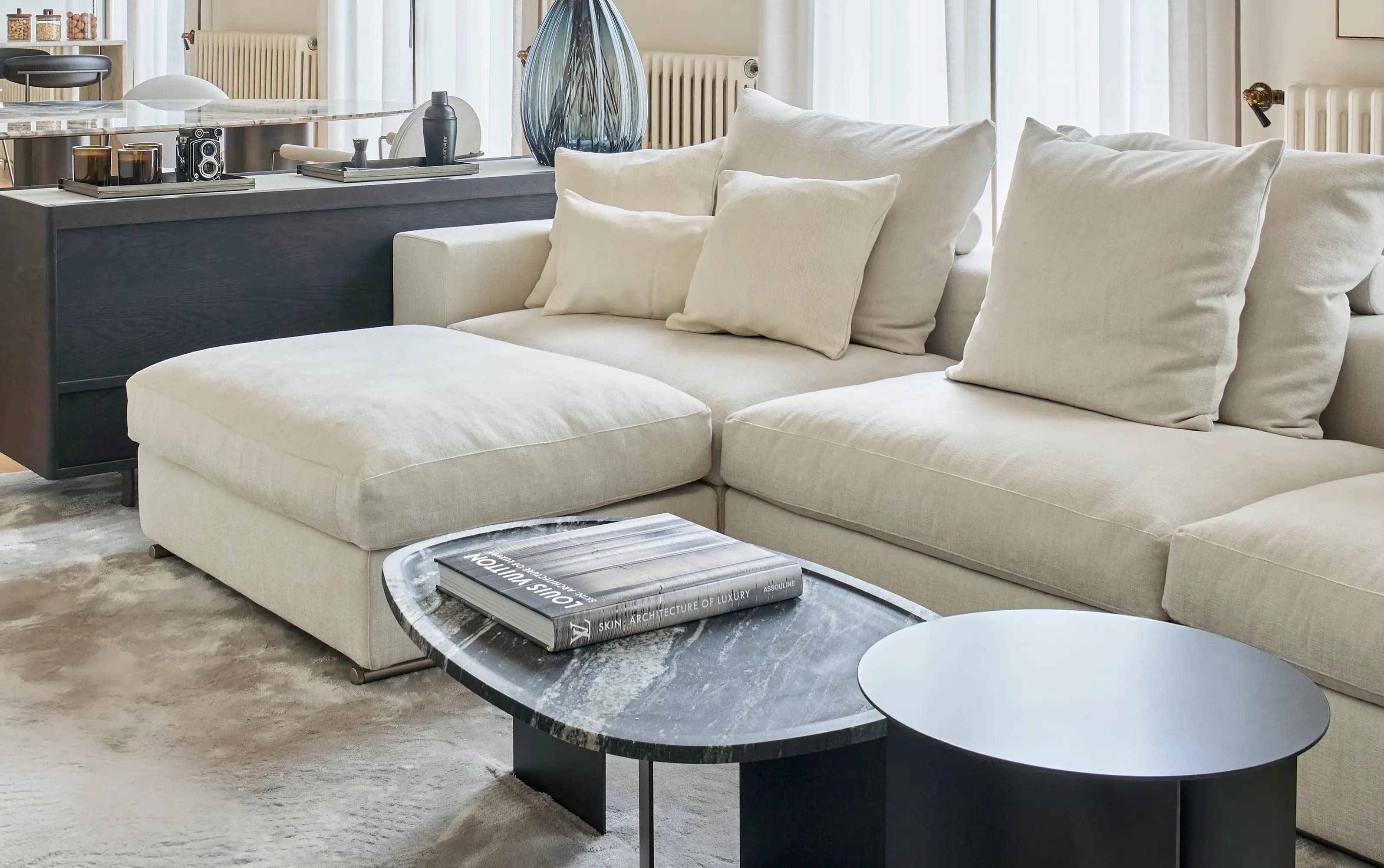 Beige sofa with soft cushions and marble coffee table · LUV Lifestyle Decoration & Styling