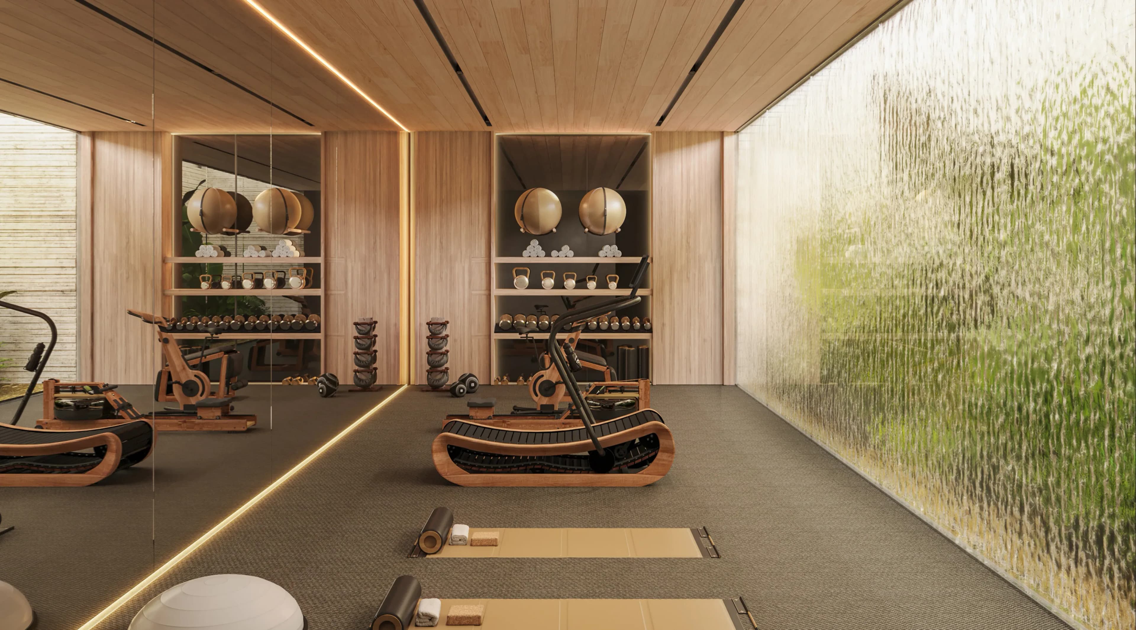 Contemporary wellness room with wooden fitness equipment and a full-height water wall